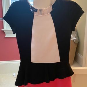 Bebe. Black, white & Pink with diagonal peplum